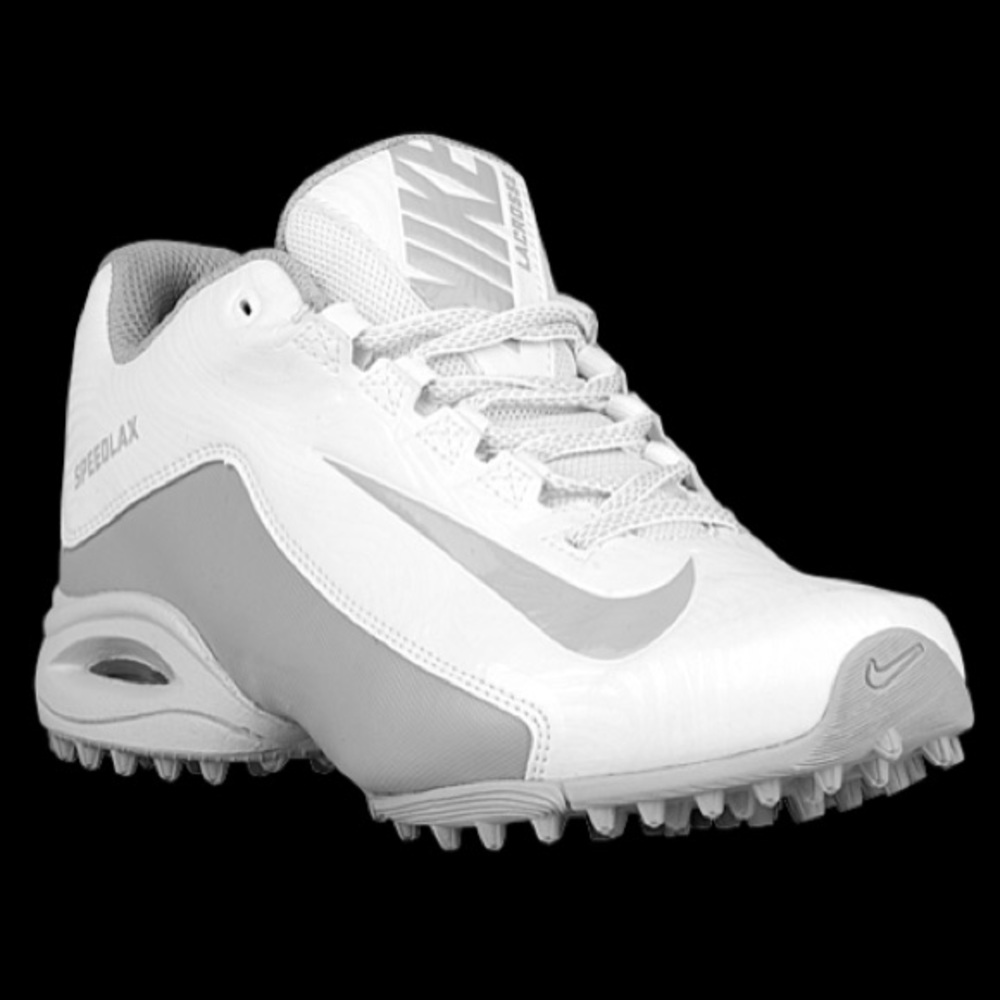Women’s lacrosse cleats and googles